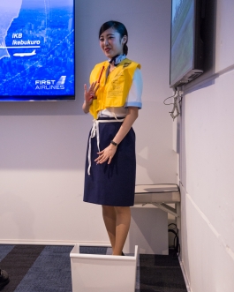 First Airlines. Flight Attendant. Ikebukuro Tokyo Japan. VR Virtual Reality flight - World's first virtual aviation facility. Photo François Cavelier