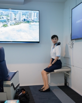 First Airlines. Flight Attendant. Ikebukuro Tokyo Japan. VR Virtual Reality flight - World's first virtual aviation facility. Photo François Cavelier